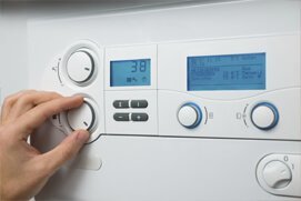 A thermostat receiving HVAC maintenance services — HVAC Maintenance Services in Richmond, VA